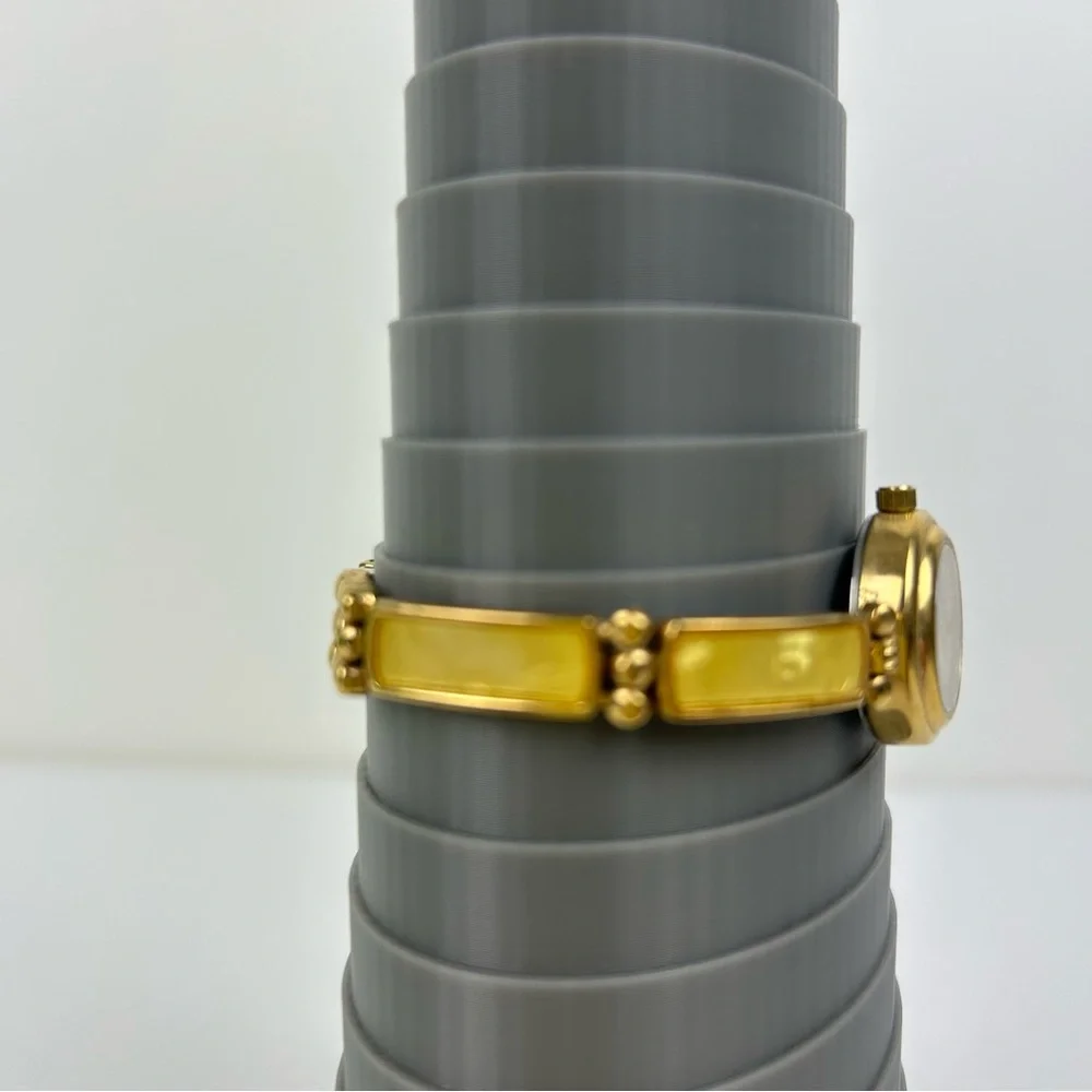 Elegant Avon Gold Tone Watch with Yellow Accents, 1